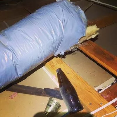 Fiberglass insulation wrap applied to HVAC ductwork with sealed seams